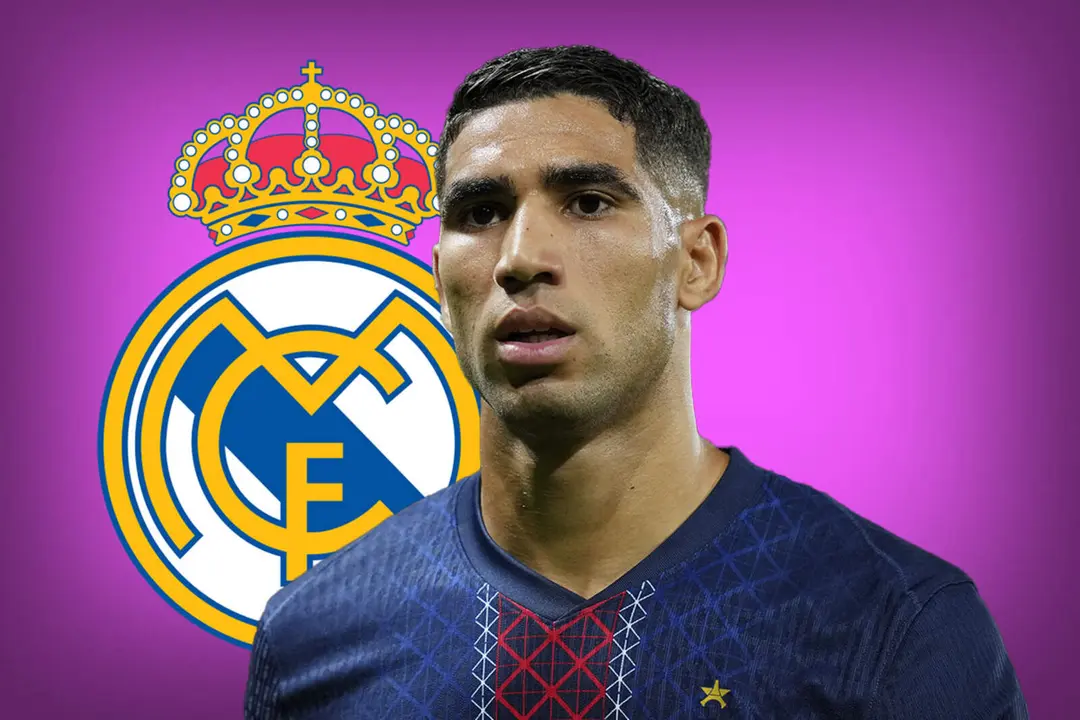 Achraf Hakimi y el escudo del Real Madrid