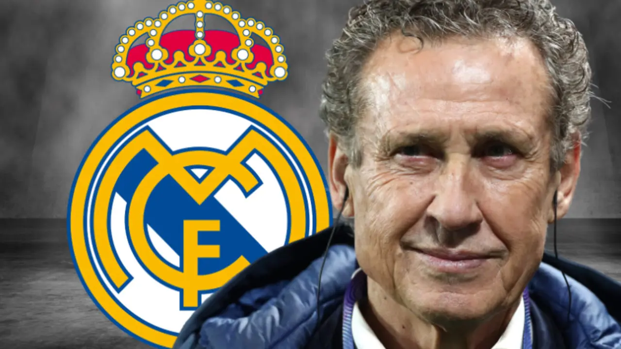 Jorge Valdano frente al escudo del Real Madrid